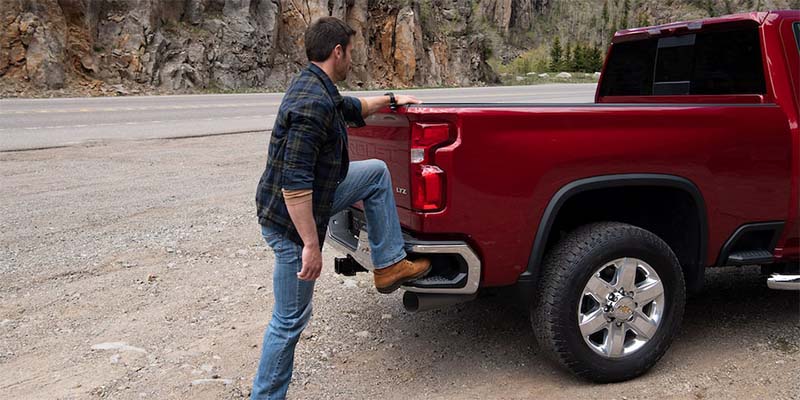 Photo of a person stepping onto a 2024 Silverado 2500 HD